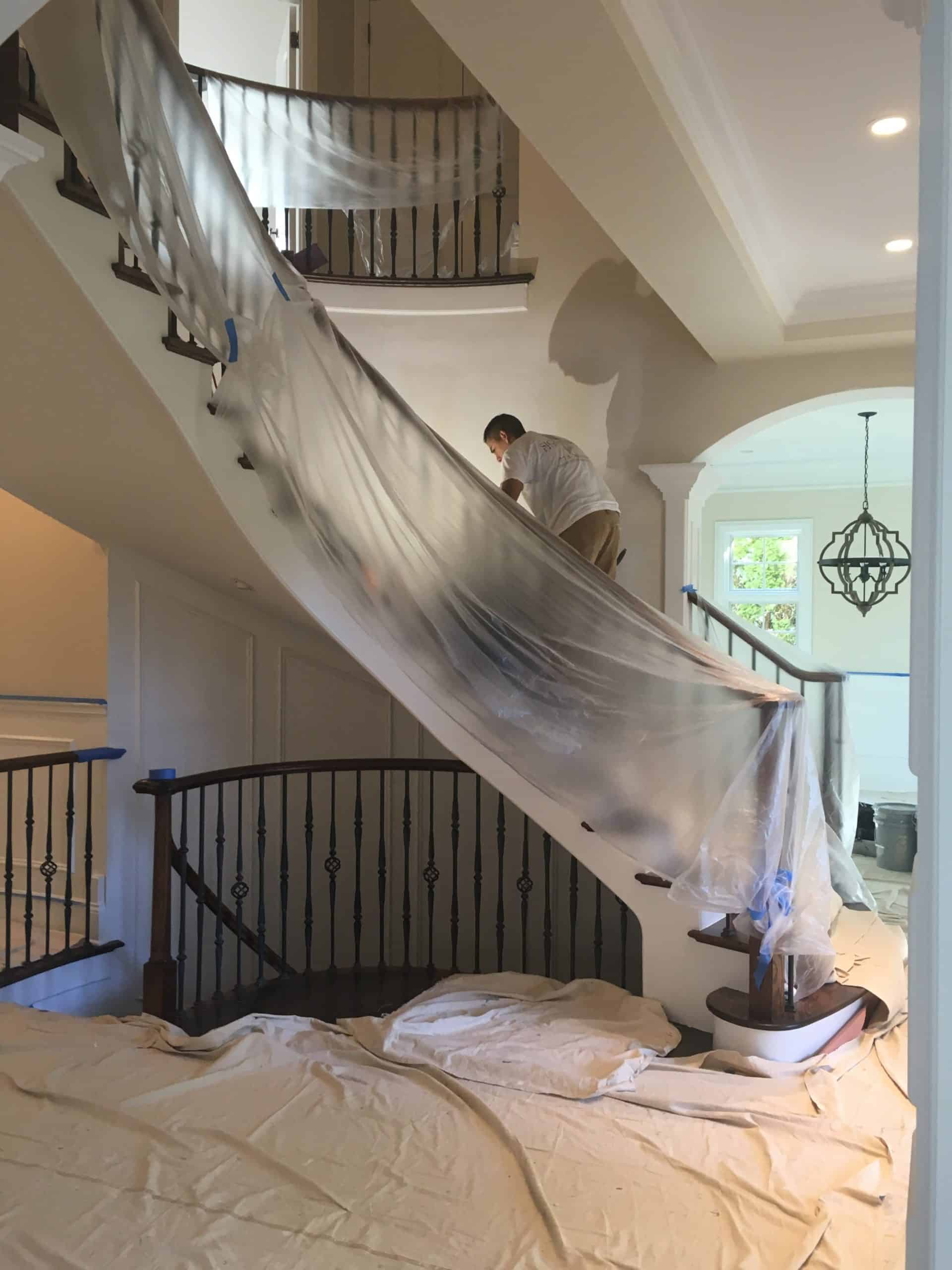 Curved staircase covered for painting